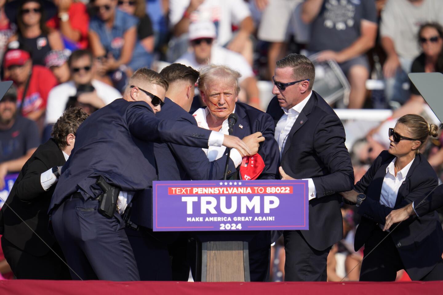 UPDATE-Trump is Injured, Secret Service Says Former President is Safe After Gun Shots Ring Out at Rally