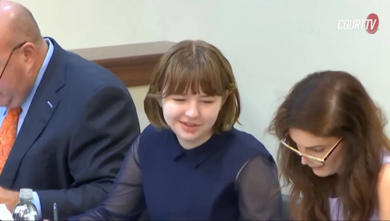 Teen Accused of Killing Mother and Attempting to Ambush Stepfather, Smiling in Court