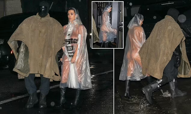 Bianca Censori Poses Completely NUDE Under See-Through Raincoat