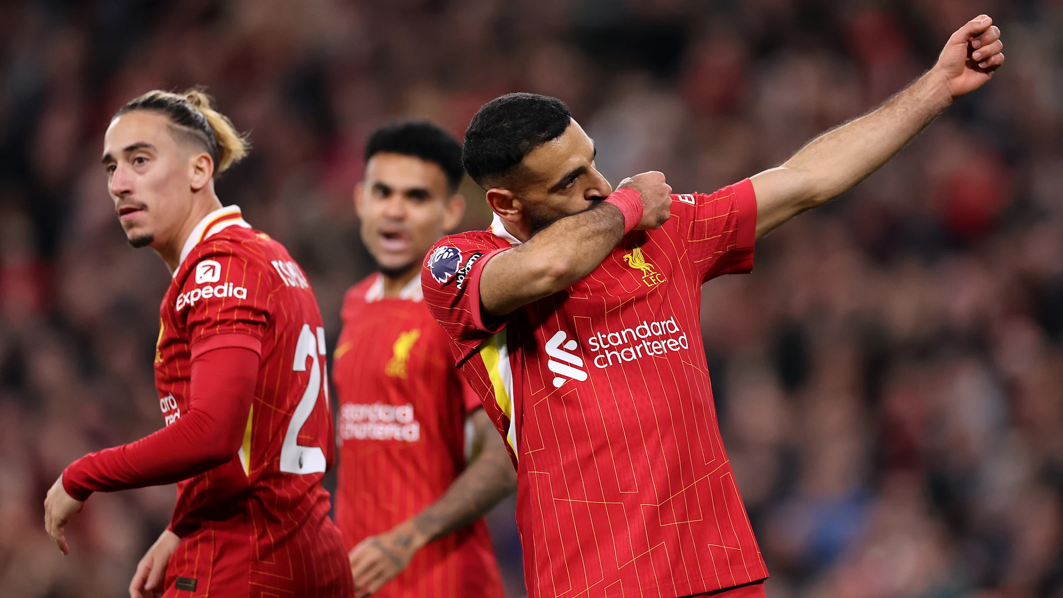 Liverpool Edge Past Brighton 2-1 to Reclaim Premier League Top Spot