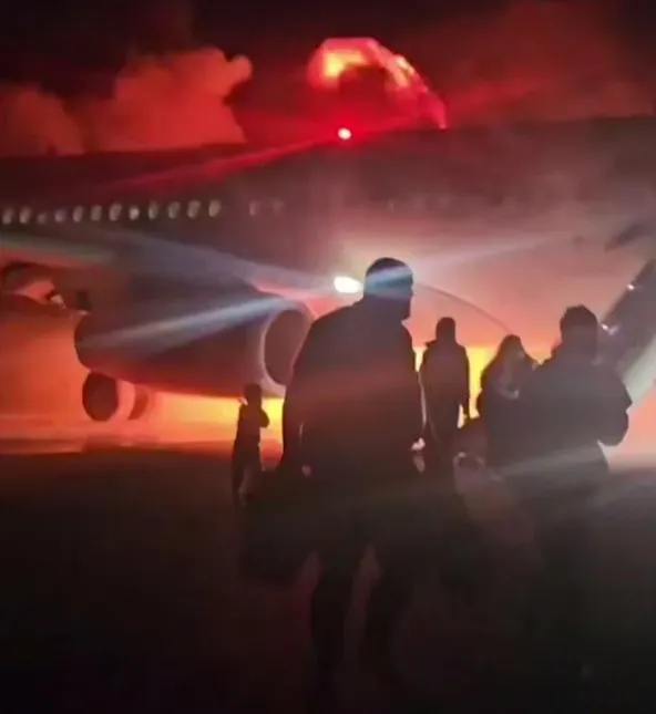 Photos of Passengers Flee Burning Russian Jet in Dramatic Turkish Airport Evacuation