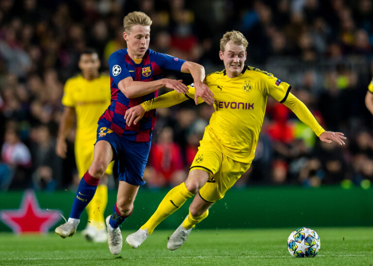 Dortmund Seeks First Home Win Over Barcelona in Champions League Battle