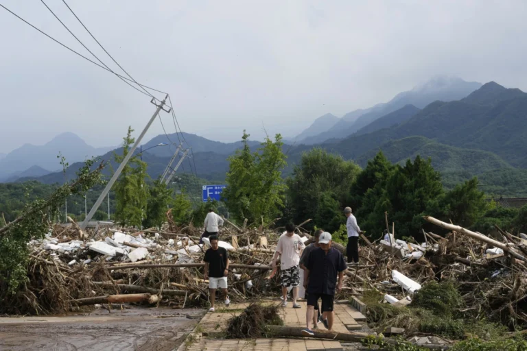 At Least 34 Dead After Torrential Rains and Flooding Sweep Beijing and Surrounding Regions