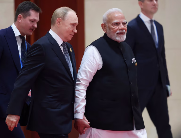 Modi and Putin meet on summit sidelines as India faces steep US tariff