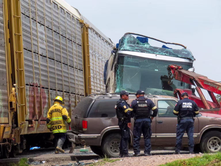 10 killed, 61 injured after freight train slams into double-decker bus in central Mexico
