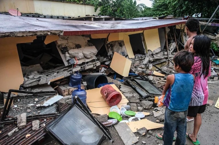 Philippines earthquake kills at least 69, dozens feared trapped