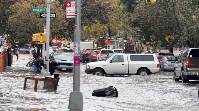 Heavy rains in New York kill 2, trigger chaos at major airports