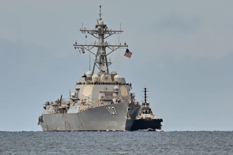US warship docks in Trinidad and Tobago, escalating military pressure on Venezuela as aircraft carrier approaches