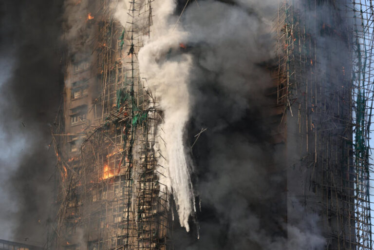Fire tears through 35-story Hong Kong tower, trapping residents in dramatic high-rise blaze