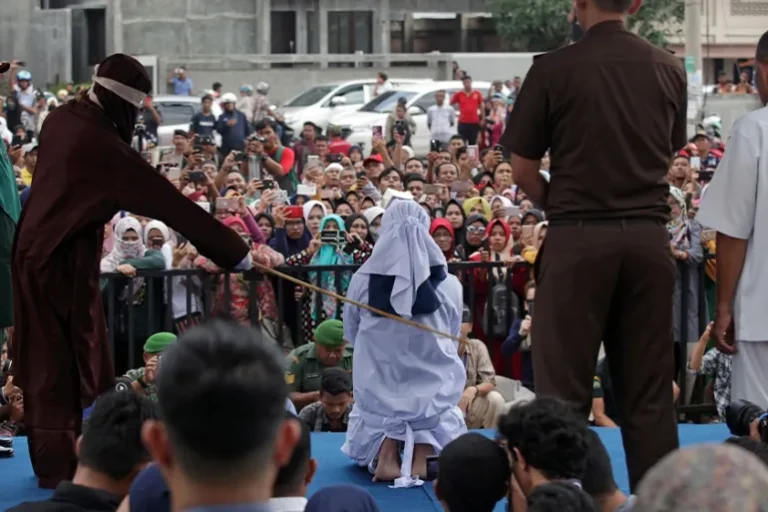 Indonesia enforces one of harshest sharia punishments in decades as woman and partner publicly caned 140 times